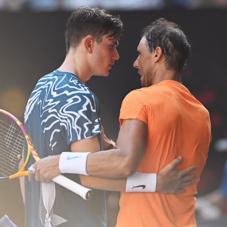 Rafael Nadal, right, speaks to Jack Draper following his victory over the British player in the first round of the Australian Open. Photograph: Lukas Coch/EPA
